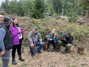 Penelakut elder Augie Sylvester teaching plants