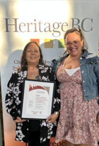 Bobbi-Jo Basarab and Resemary Georgeson receiving Heritage BC Award for Feed the People project